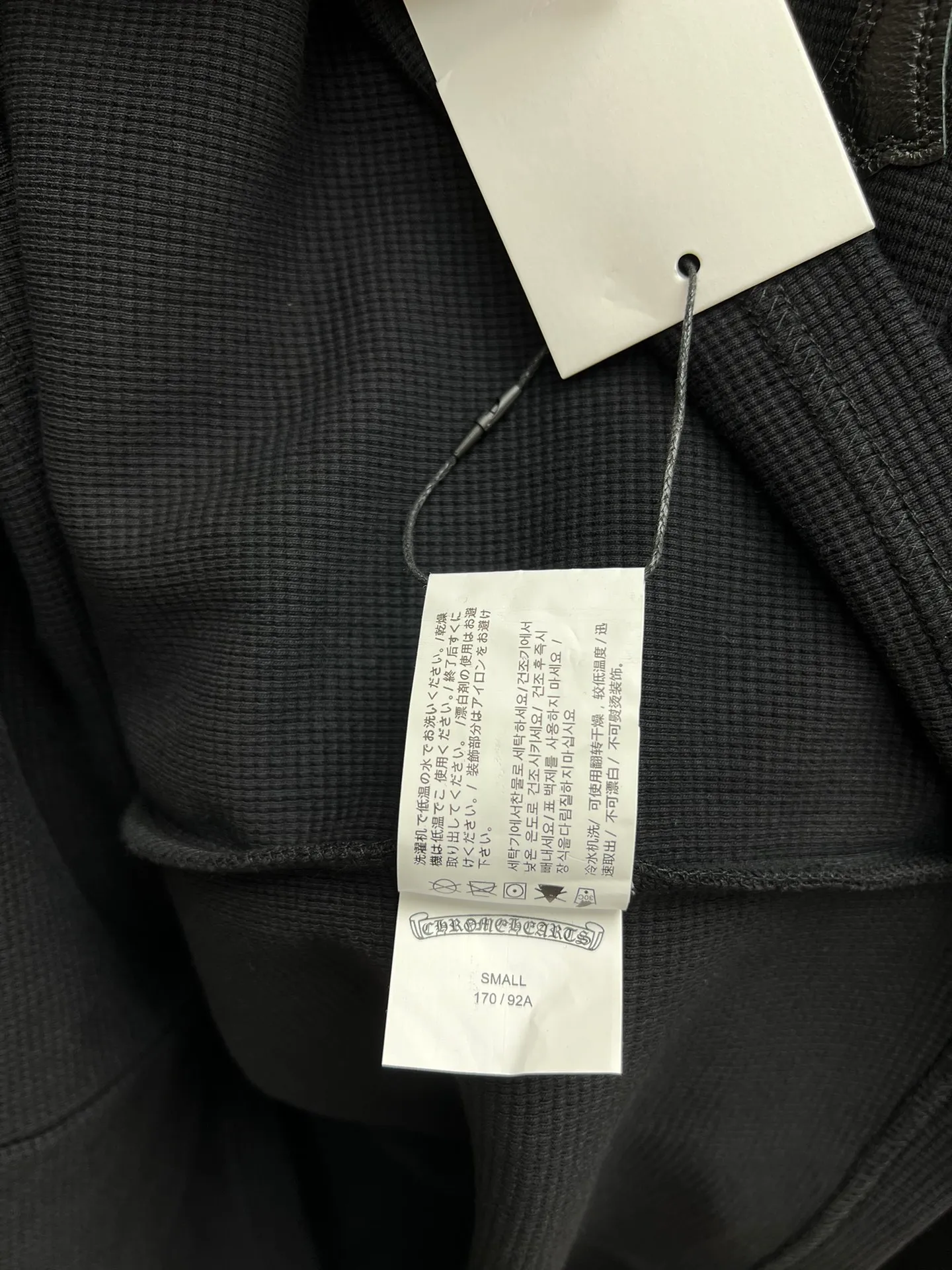 🅿️440 Crow Heart 25SS leather henley collar waffle sweatshirt. The fabric is made of 350g cotton waffle double-layer material before washing. Size: S.M.L